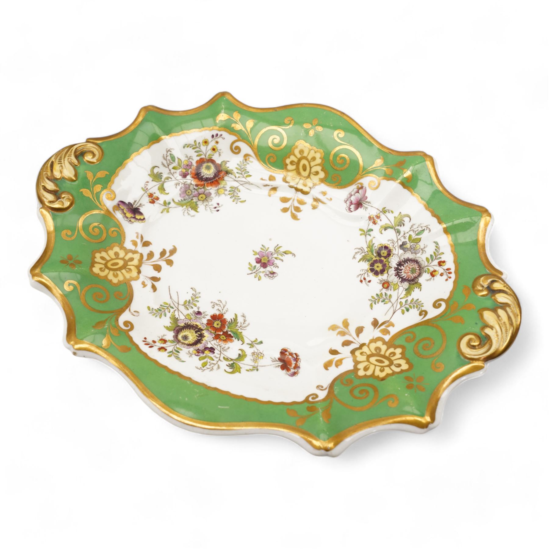 Large early 19th century Derby porcelain dessert basket, of rectangular twin-handled form, with cobalt blue and gilt decoration, painted marks beneath, L29cm together with a 19th century porcelain dessert service, decorated with floral sprays within a green and gilt border, comprising eight plates and three serving dishes, pattern no. 701/1