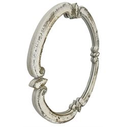 French design carved pine wall mirror, the frame in the form of conforming c-scrolls, plain mirror plate, in distressed white paint finish 