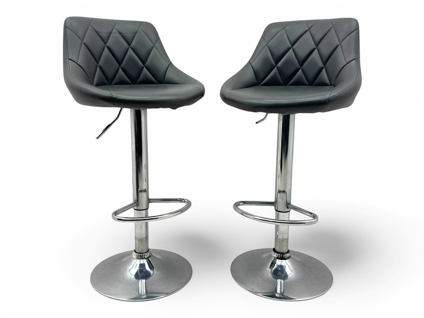Pair of contemporary adjustable ‘Woltu’ bar stools, diamond-quilted grey faux leather seats with low backs, chrome bases with footrests and hydraulic height adjustment mechanism