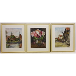  Still Life of Flowers, pastel signed by Carl Otto Fey (German 1894-1971) and Village Scenes, two pastels signed by the same hand 41.5cm x 42cm, in matching frames (3)  