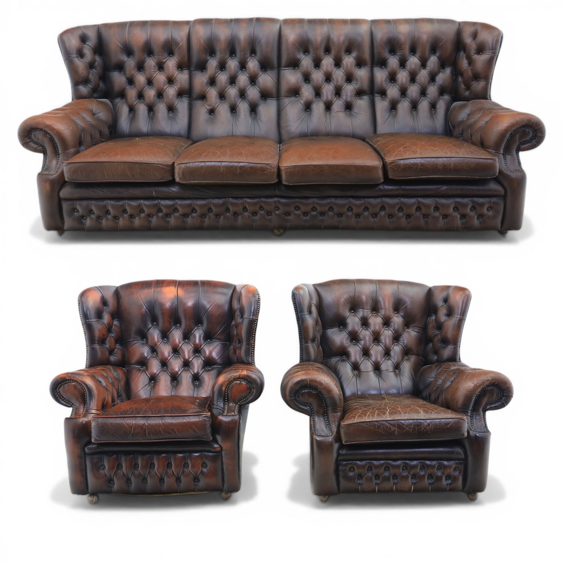 Georgian design Chesterfield lounge suite, comprising highbacked four seat sofa and pair armchairs, upholstered in chocolate brown leather, Armchairs (H 90cm, W 91cm) Sofa (H 91cm, W 238cm)