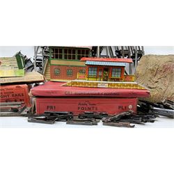 Hornby '0' gauge - layout accessories comprising PR1/PL1 Points, CR1 Right Angle Crossing and CA2 Acute Angle Crossing, all boxed; tin-plate signal box; tin-plate level crossing; textured wooden tunnel, possibly pre-WW2; and quantity of track, some boxed; together with '00' gauge tin-plate station