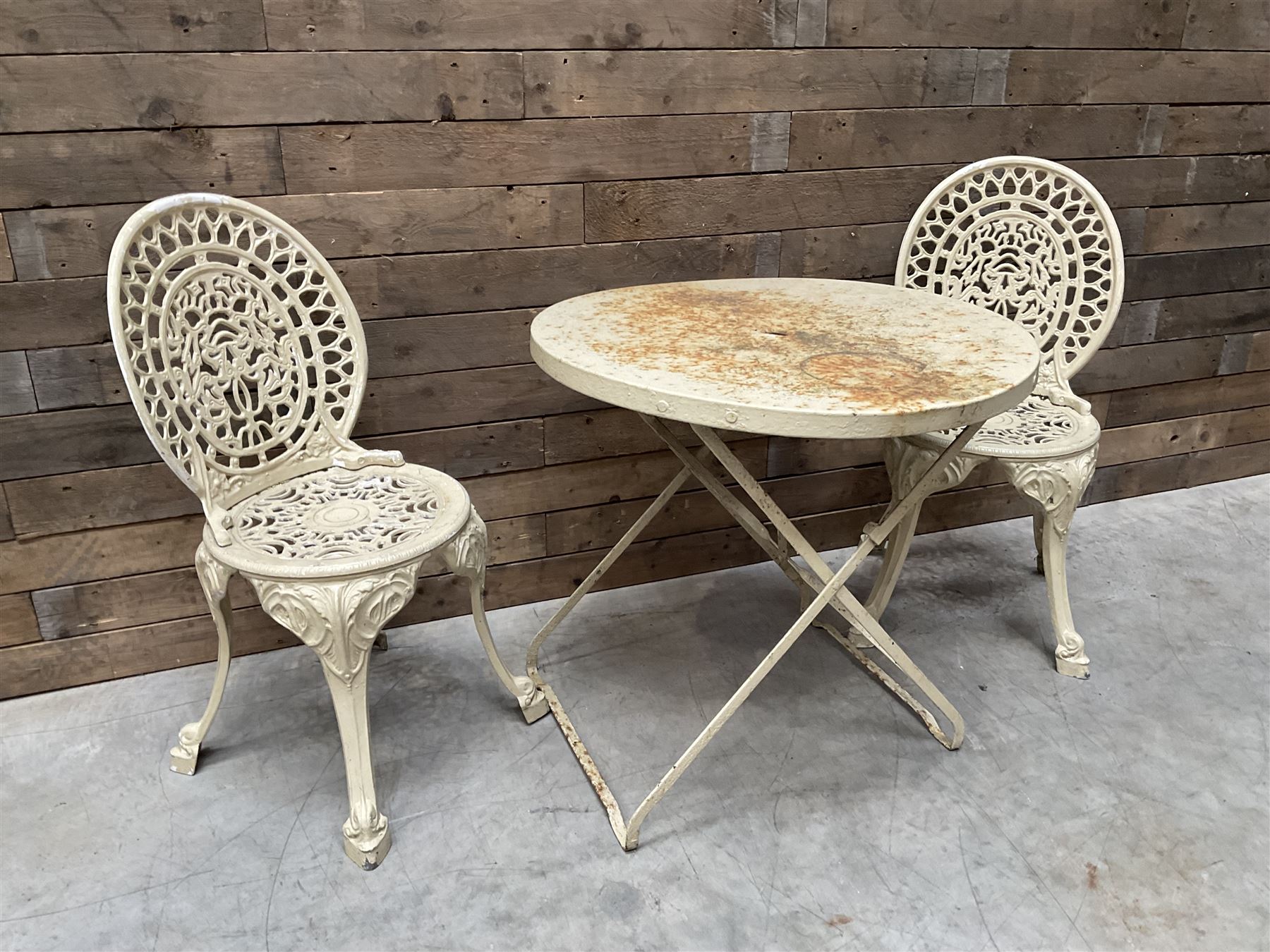 Circular cast aluminium garden table (D74cm, H68cm), and two chairs