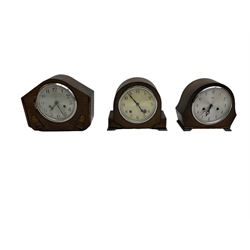 Three oak cased 1950’s spring driven striking mantle clocks and a 1930’s spring driven Westminster chiming mantle clock. With pendulums.