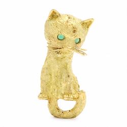 18ct gold cat brooch, set with round cabochon cut emerald eyes and textured fur, stamped 750