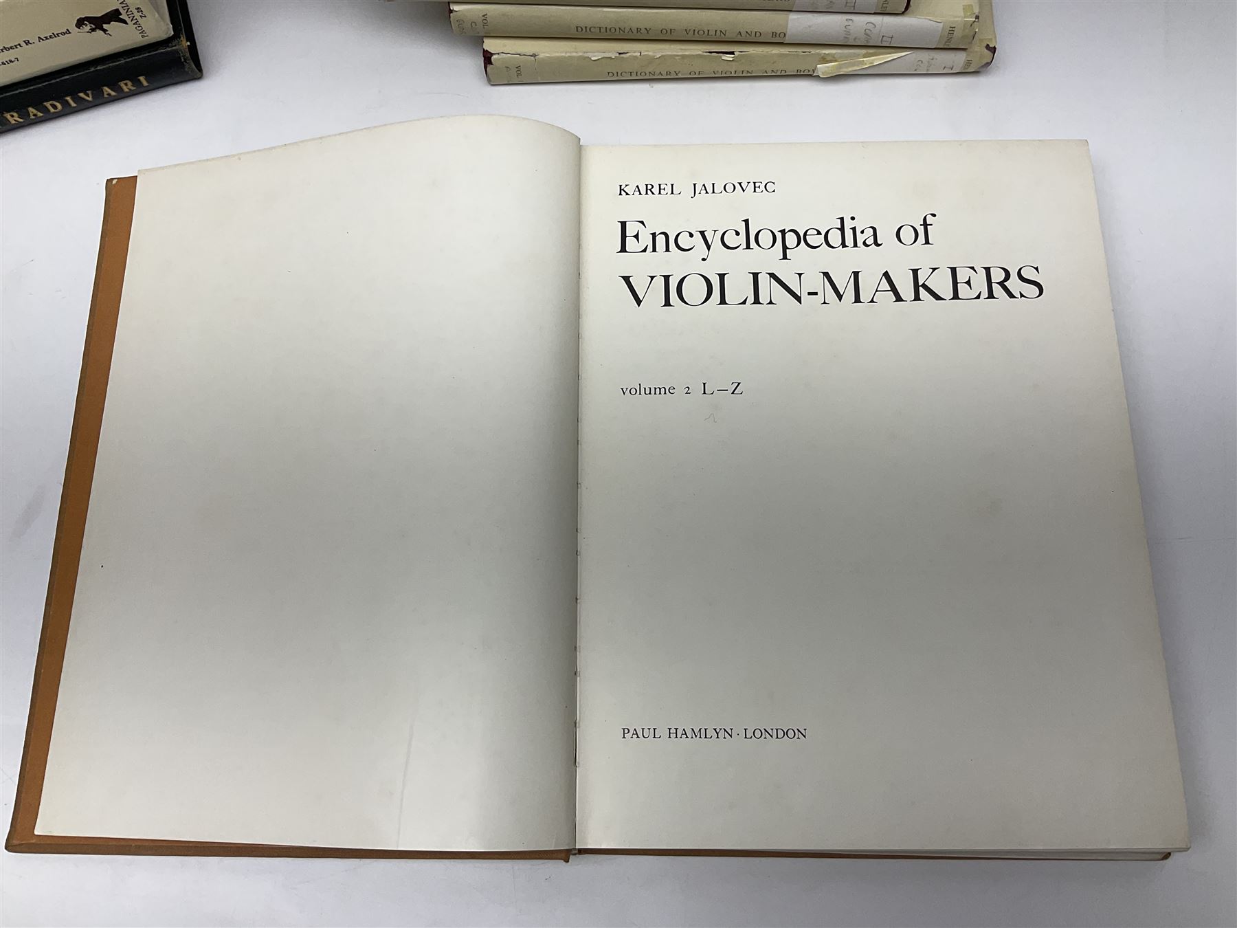 Fourteen books on violins and violin makers including Henley William: Universal Dictionary of Violin and Bow Makers. Five volumes. 1959/60. All first editions with dustjackets; Jalovec Karel: Encyclopaedia of Violin Makers. Two volumes. 1968. Vol.1 with d/j; Heron-Allen Ed.: Violin making As It Was, And Is. Two copies 1984 & 1991. Both with d/j; Henley W.: Antonio Stradivari. 1961; Fetis F.J.: Anthony Stradivari Celebrated Violin Maker. 1964 facsimile edition; Boyden David D.: catalogue of the Hill Collection of Musical Instruments in the Ashmolean Museum. 1979; and two others (14)