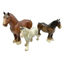 Group of three Beswick Shire horses, comprising CH. Burnham Beauty mare in matte finish, dapple grey horse and bay horse, all with stamped marks beneath