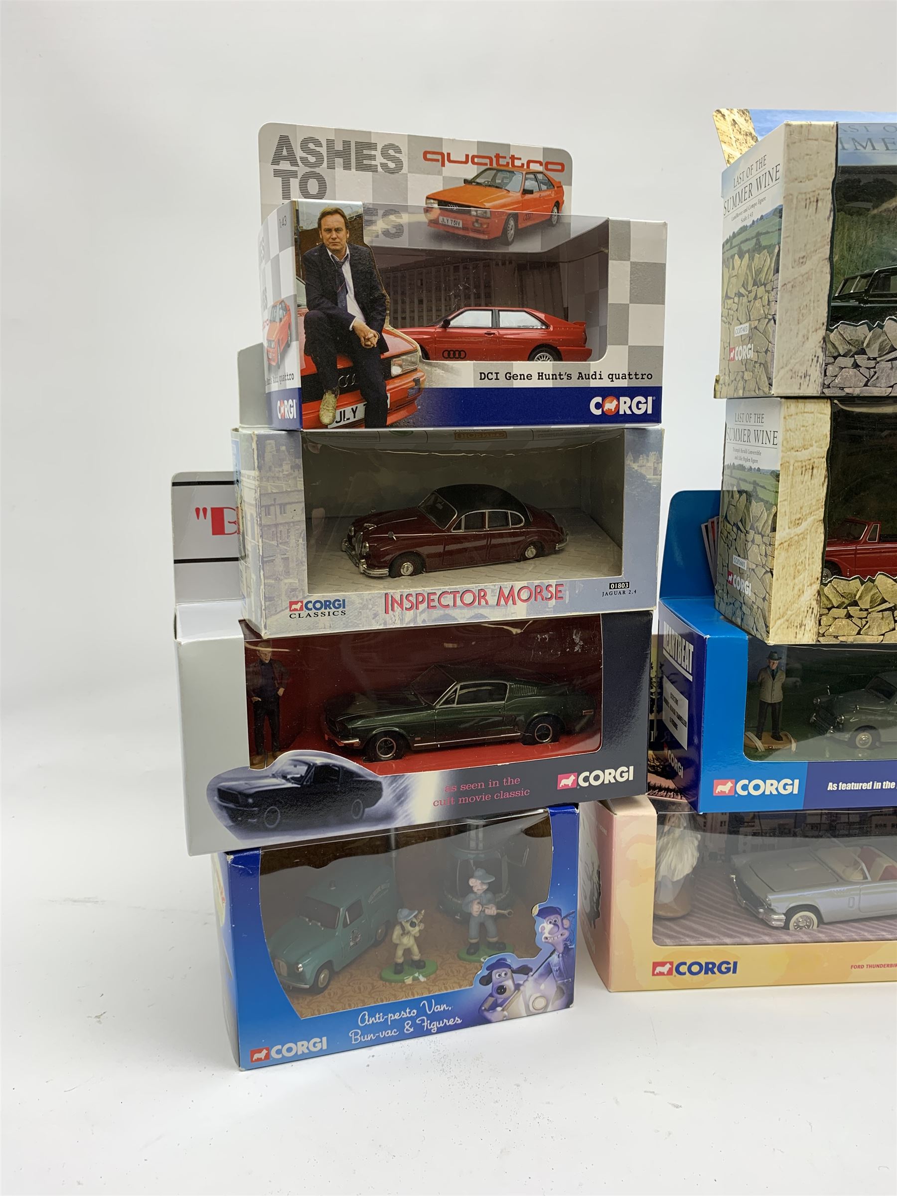 Eighteen Corgi die-cast models of TV & film interest including Dad's Army (2), Last of the Summer Wine (2), Heartbeat (2), Blues Brothers, Bullitt, Marilyn Monroe, Return of the Saint, Thunderbirds FAB1, The Avengers etc; all mint and boxed (18)