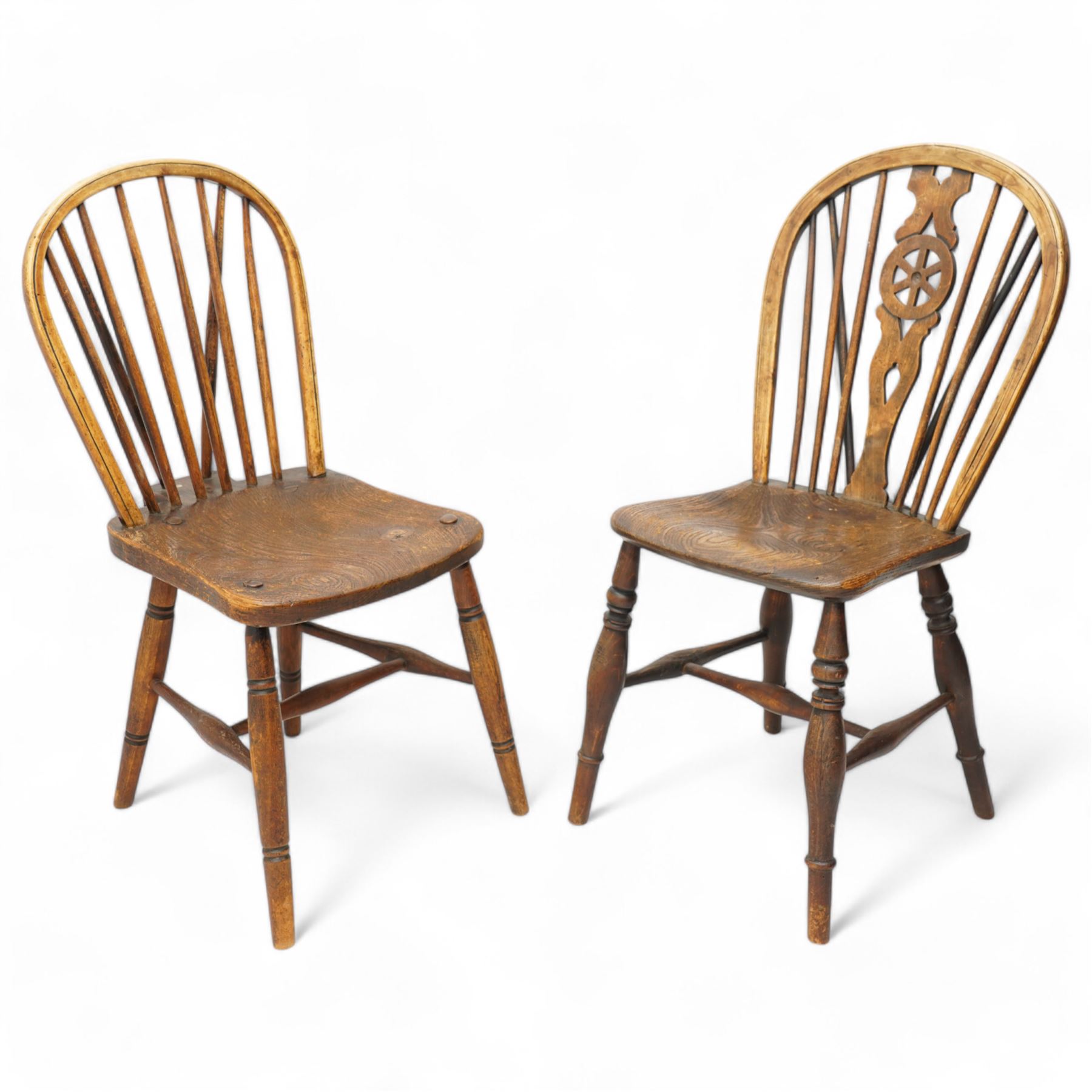 19th century elm and beech hoop and stick back Windsor chair, dished seat on turned supports united by H-stretchers, the seat stamped 'T.H. Filmer C&M 1859' (W38cm, H86cm);19th century elm and beech Windsor chair, hoop and stick back with pierced wheel splat, dished seat on turned supports united by swell turned stretchers (W36cm, H88cm)