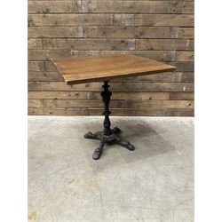 Cast iron Britannia circular pub table, and two pedestal cast iron bases (3)