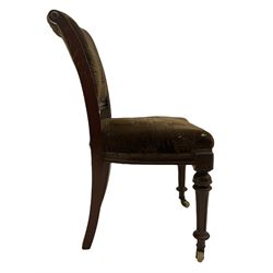 Pair Victorian mahogany side chairs, curved and moulded upright back rails, shaped seats, on turned and fluted supports with brass and ceramic castors