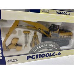 Four Joal Komatsu 1:50 scale die-cast models comprising WA600-3 Log Loader, HD605-5 Dump Truck and two PC1100LC-6 Material Handler, together with a CAT Articulate Truck, all boxed (5)