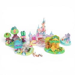 Five Bluebird Polly Pocket Disney playsets, comprising 1998 Jungle Book, complete with three dolls, village hut and tree swing, 1998 Winnie the Pooh 100 Acre Wood, with Winnie the Pooh, Piglet, Tigger, Eeyore and Roo figures and honeypot accessory, 1996 101 Dalmatians Puppies' Adventure, with Cruella De Ville and six puppies, 1995 Cinderella's Enchanted Castle, complete with eight dolls and carriage  and 1997 Mulan's Brave Journey with four dolls and Khan the horse