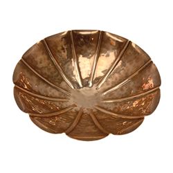 Early to mid 20th century copper Arts and Crafts copper fruit bowl by Cobral, the planished body with scalloped edge raised upon three brass bun feet, with marks beneath, D20.5cm H6.5cm