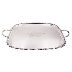 Edwardian silver twin handled tray, with oblique gadrooned rim and presentation engraving to the centre, hallmarked James Dixon & Sons Ltd, Sheffield 1907, not including handles W46cm