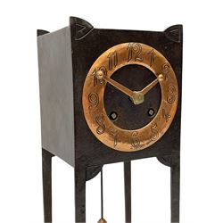 A German Arts and Crafts 'Gesamtkunstwerk' mantle clock c1890 in a square formed iron case with abalone incised triangles to each corner, case raised on four legs with inward facing feet,  convex copper chapter ring hand engraved with upright Arabic numerals, conforming copper hands in an individual style, with an eight-day spring driven rack striking movement manufactured by Lenzkirch, striking the hours and half hours on a bell, conforming steel pendulum with a hand-crafted faceted pear-shaped copper bob. With key.
Lenzkirch were one of the most prolific and respected German clock manufacturers of the 19th and early 20th century, it is highly probable that this movement was removed from another clock and incorporated into this artisan case when made at the end of the 19th century.