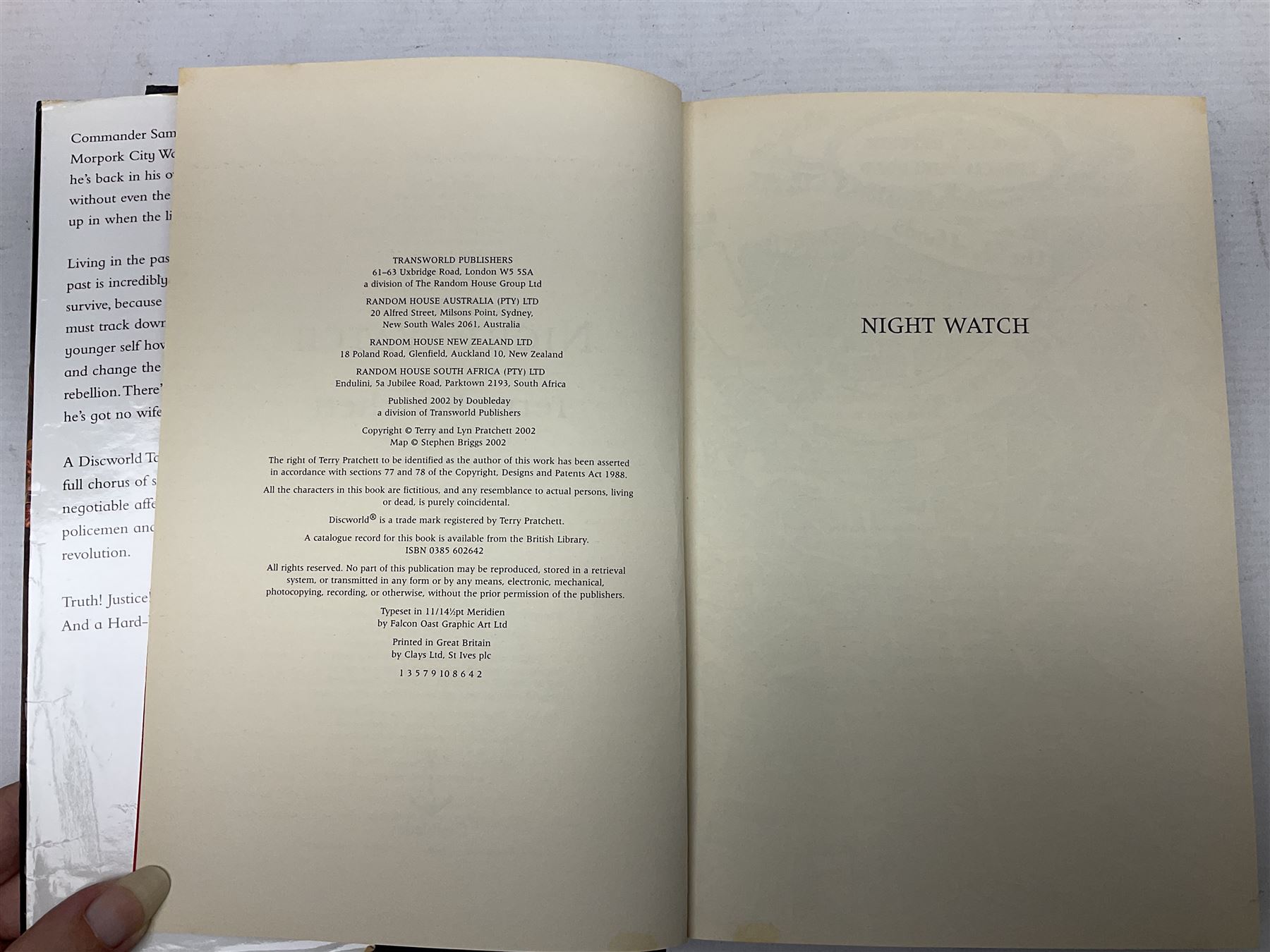 Collection of twenty-three hardback Terry Pratchett books, comprising approximately eighteen first editions including The Fifth Elephant signed & inscribed by Pratchett, all with dustjackets