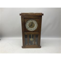 An assortment of mantle clocks and wall clocks for spares or repair 