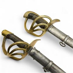  19th century Spanish cavalry sword, the blade marked 'Toledo 1868' with pierced brass hilt and wire wound grip with steel scabbard, blade length 93cm and another similar Spanish sword, unmarked blade (2)