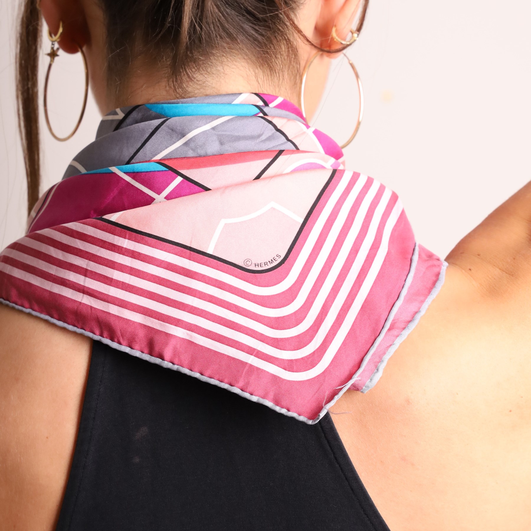 Hermès - ‘Hermès Sport’ silk scarf, designed by Anamorphée, first issued 2013, grey, burgundy, pink, blue and salmon colourway with hand-rolled edges