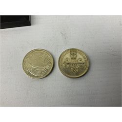 Great British and World coins including Queen Victoria 1887 and 1888 double florins, King George V 1929 halfcrown, King George VI 1951 Festival of Britain crown, commemorative crowns, Queen Elizabeth II 1953 nine coin set in blister pack, 1989 and 1995 two pound coins, various pre-decimal pennies and other coinage