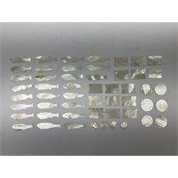 Collection of fifty two Chinese mother of pearl gaming counters or tokens, of various size and form including rectangular, circular and fish shaped examples, various decoration including floral motifs, largest rectangular examples L4cm