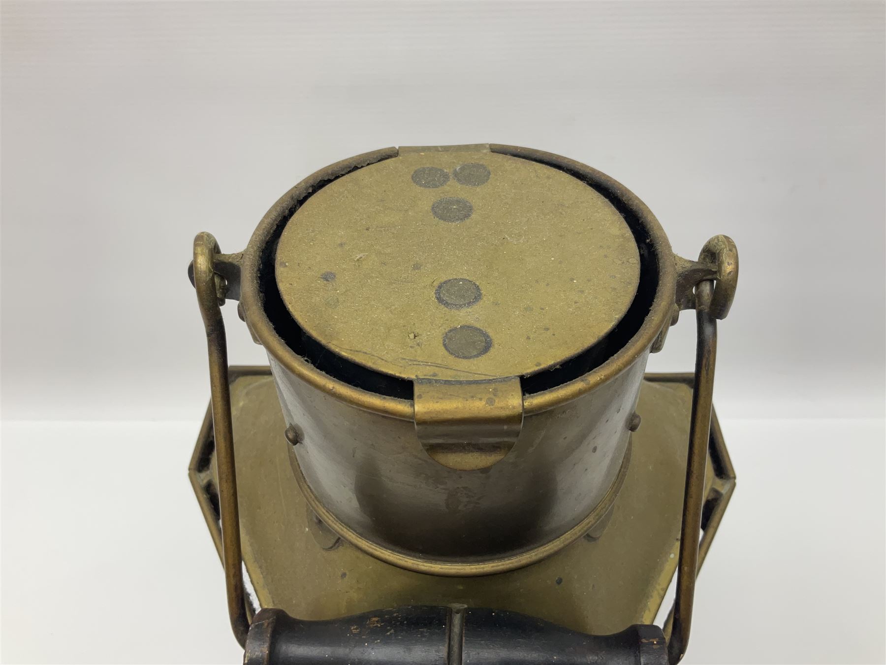 Large brass maritime lamp by Griffiths & Sons Birmingham with swing handle, threaded mounting bracket and associated oil burner, H41cm excluding handle
