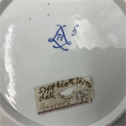 19th Sèvres style porcelain cup and saucer, the cup painted with a figural scene, against a scalloped border of scrolling floral swags on a blue ground, together with a Sèvres soft paste porcelain coffee can and saucer, painted with panels of exotic birds, roses and a border of cornflowers, LL monogram enclosing date letters H above painters mark, coffee can H6.5cm, saucer D13.5cm (2)