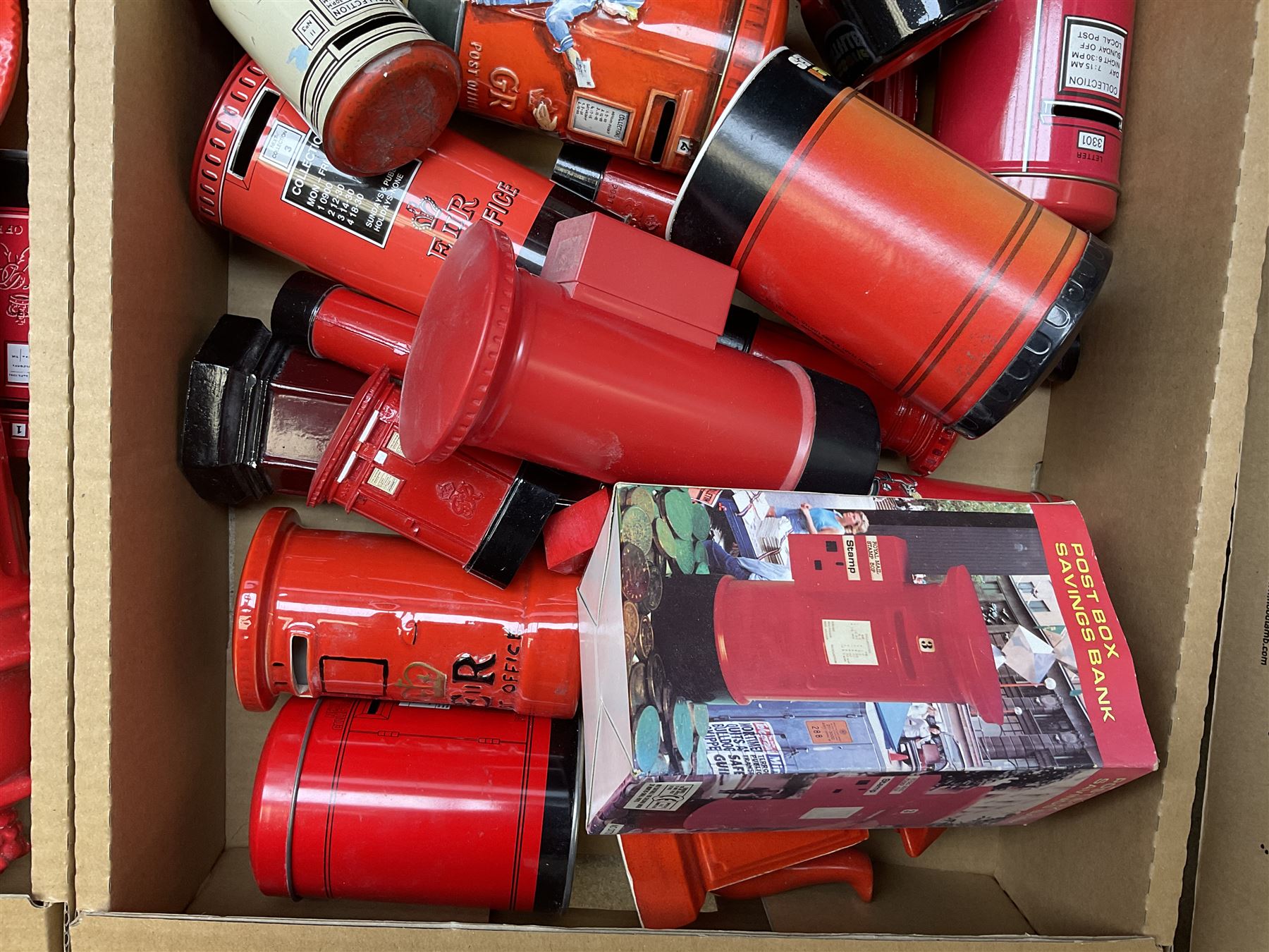 Collection of Post Box money boxes comprising ceramic, tin plate and plastic models, to include Crested Ware money boxes bearing motto ‘I Can’t Get a Letter From You So Send You The Box’ etc in three boxes