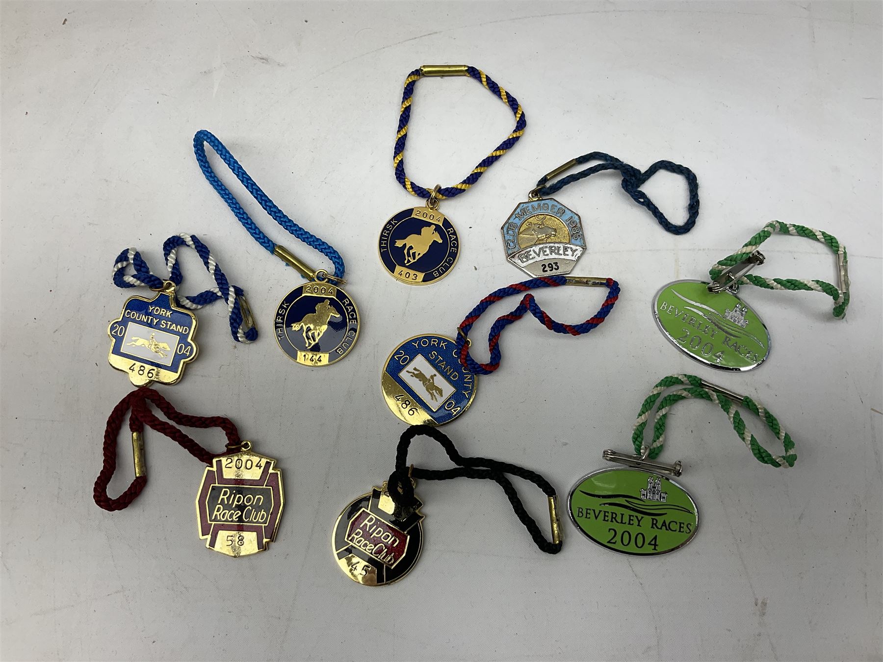 Thirty nine enamelled horse racing badges, to include badges from York, Ripon, Beverley Goodwood etc