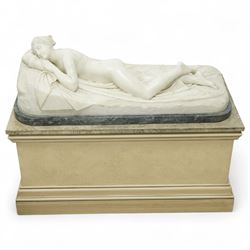 After Antonio Canova (Italian 1757-1822): 'Sleeping Venus', an Italian carved white marble figure of a reclining nude, the serene figure depicted lying on her side, her head resting on a cushion and one knee gently raised, a loosely draped sheet partially covering her lower body, on a rectangular base with rough-hewn surround, raised on a marble plinth over a sarcophagus style pedestal, circa 1900

Provenance: Kirkham Hall

Notes: A late-19th-century homage to Canova’s neoclassical models, reflecting the Grand Tour taste for idealised classical beauty and the refined finish characteristic of Italian workshop marbles of the period