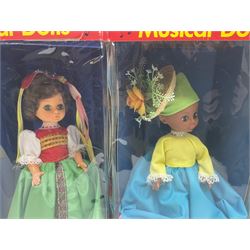 Four Mayfair Products Musical Dolls of Many Lands; original boxes and delivery boxes; and set of twelve Nationality Dolls with Sleeping Eyes; boxed (16)