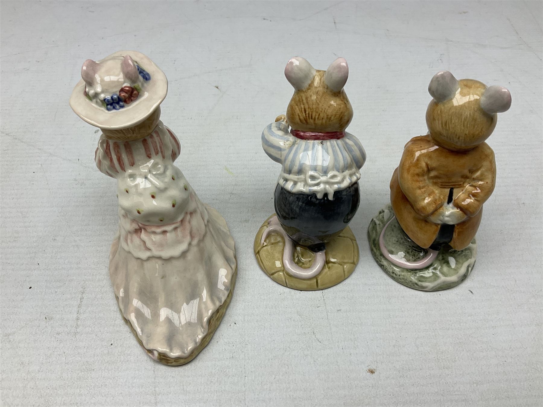 Six Royal Doulton Brambly Hedge figures, comprising Catkin DBH 12, Clover DBH 16, Lord Woodmouse DBH 4, Poppy Eyebright DBH 1, Mr Apple DBH 2, Old Mrs Eyebright DBH 9 and Beswick Beatrix Potter Appley Dapply figure, all with printed marks beneath
