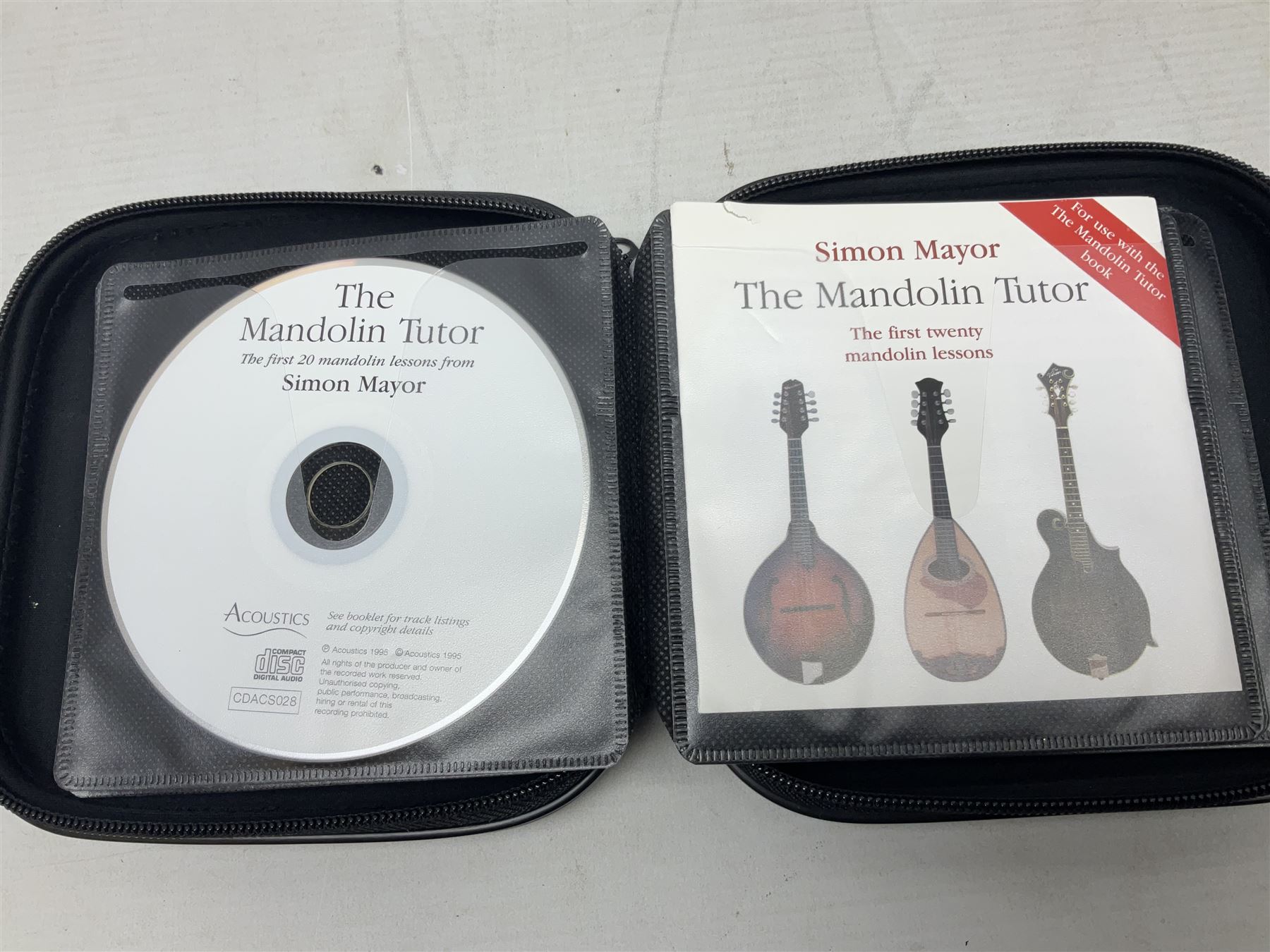 Eastman eight-string mandolin model MD504, serial no.140435406, L66cm; in TGI hard carrying case; together with case of instructional CDs
