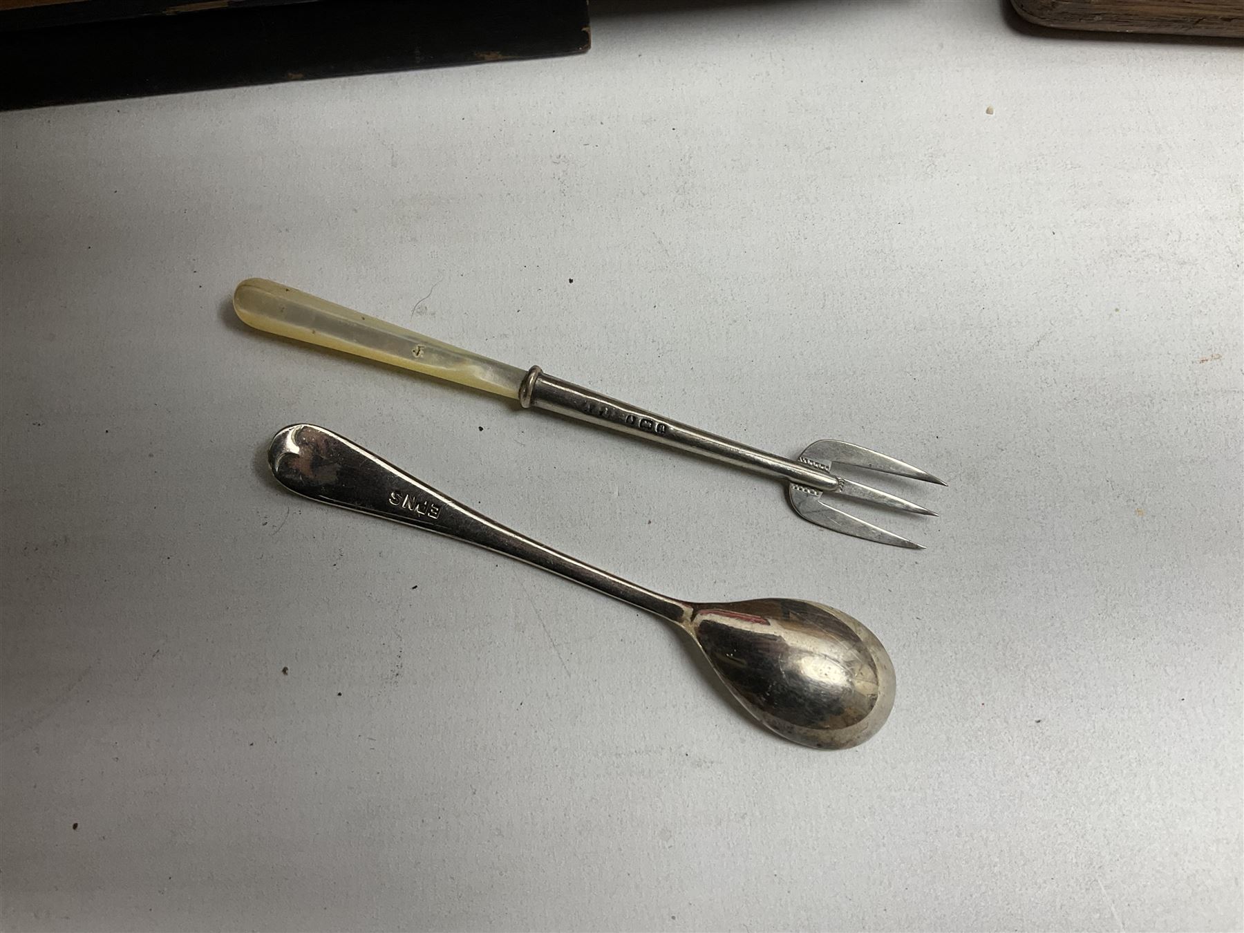 De Montfort cased canteen of silver plated cutlery for six place settings, together with further cased canteen of spoons and forks stamped Bon Marche