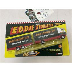 Corgi/Atlas - eight Eddie Stobart die-cast scale models comprising Corgi 59503, TY86705, TY86719, TY87001 and TY87704: Atlas Scalia Topline Curtainside, Atkinson Borderer Flatbed and Volvo FH fridge Trailer, with certificates of authenticity; tin of Eddie Stobart coasters; all with original boxes 