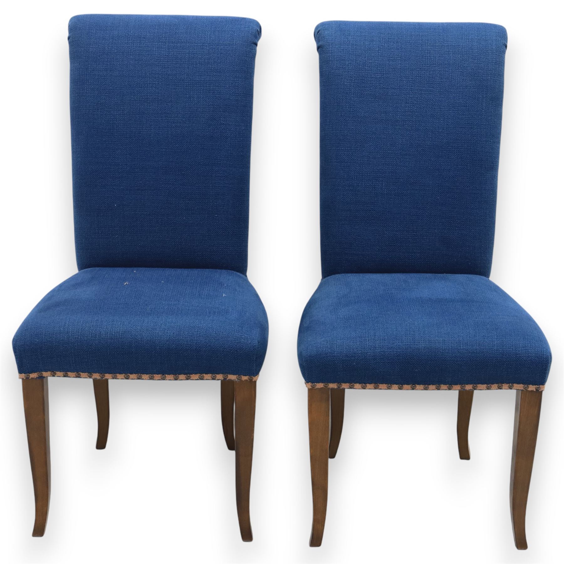 Contemporary set of four blue high back upholstered dining chairs