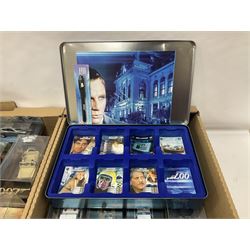 Fabbri James Bond Collection - over one hundred and ten die-cast models in perspex display cases as issued periodically; and a quantity of associated magazines and trading cards, in five boxes