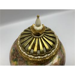 Mid 20th century Royal Worcester potpourri vase and cover decorated by Alan Telford, of ovoid form with inner cover and pierced gilt outer cover with bud finial, upon short gilt circular foot, the body part moulded with basket weave bands in gilt and bronze, and hand painted with a still life of fruit upon a mossy ground, signed Telford, with black printed mark beneath and painted shape number 1286, H25.5cm