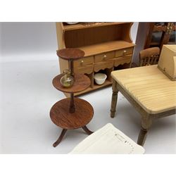 Doll's house wooden furniture - over twenty items including good quality pine Welsh dresser by Tony of Lincoln; tall 'glazed' bookcase; two-tier side cabinet; grand piano; bedside chest, mule chest, Canterbury; cradle; Georgian style hanging corner cupboard; dumb waiter; tables; chairs; rocking chair etc; various scales