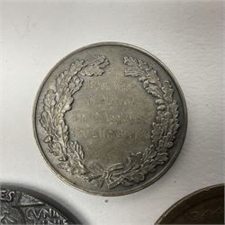 RMS Lusitania iron medallion dated 5th May, 5.5cm diameter, boxed with St Dunstan's Blinded Soldiers Profit paperwork; another unboxed similar Lusitania medallion; 30th Corps Alamein Cuxhaven medallion; Battle of Jutland 1916 silver memorial pendant; Navajo Code Talkers medallion 2000; and five other military related medallions