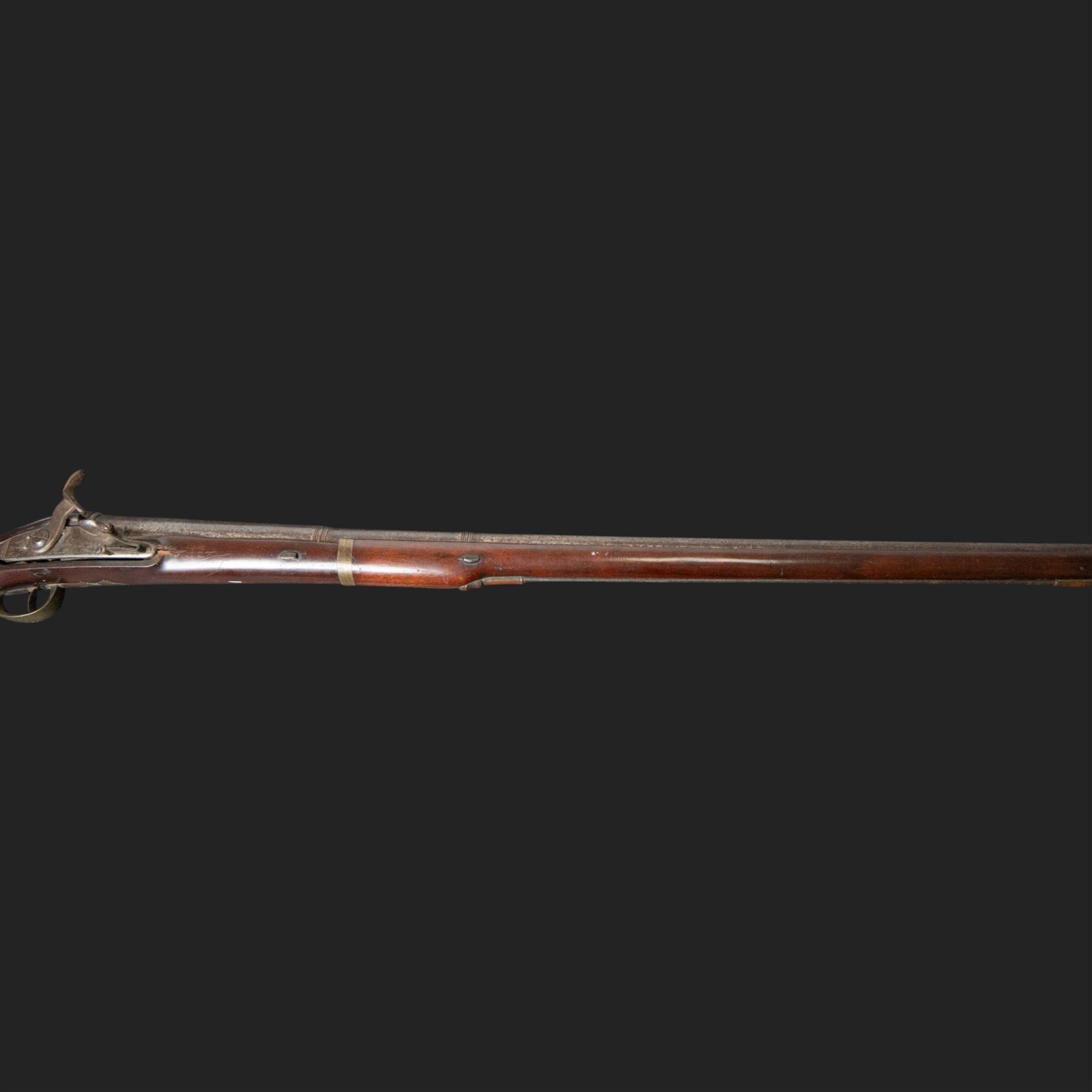 19th century Indian Brown Bess style flintlock musket, the 138cm round steel barrel ram rod beneath, overall L174cm
