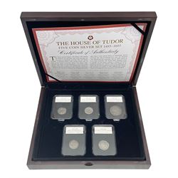 'The House of Tudor Five Coin Silver Set 1485-1603', comprising Henry VII 1485-1509 silver half groat, Henry VIII 1526-1547 silver groat, Edward VI 1547-1553 silver shilling, Queen Mary 1553-1558 silver sixpence and Elizabeth I 1558-1603 silver sixpence, housed in a coin display with technical specifications 