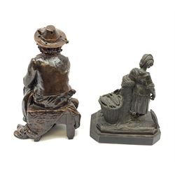 Two spelter figures, the first modelled as a fisherwoman with catch, the second as a seated male figure, tallest H26.5cm. 