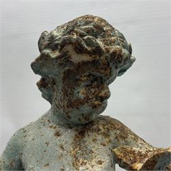 Garden ornament modeled as a putti with butterfly, H50cm