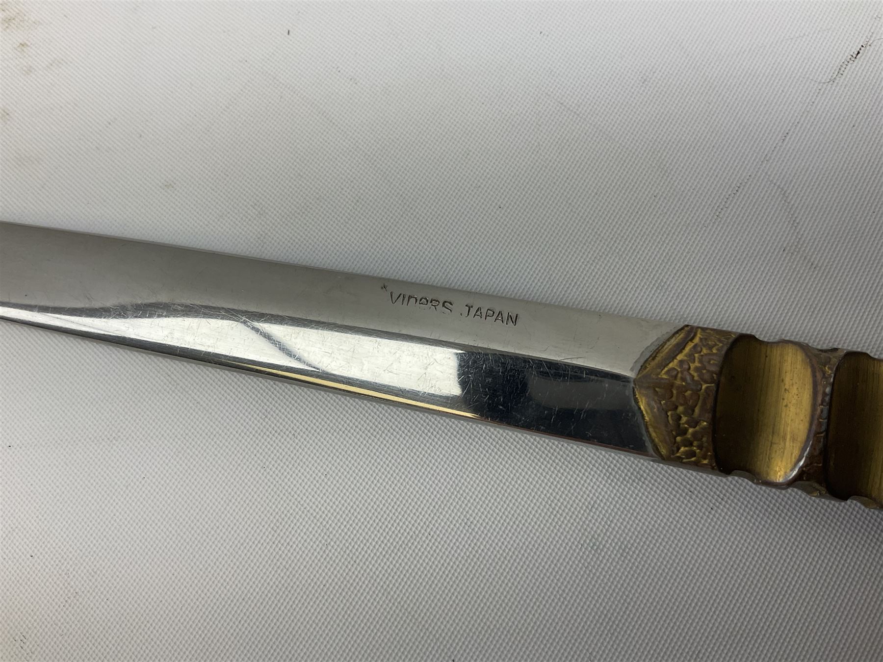 Malayan Kris dagger, the 31.5cm double edged straight heavy damascus blade with copper ferrule; carved hardwood grip; in large wooden throated scabbard with floral decorated white metal covering L47.5cm overall; a kris blade with adapted antler grip; and five various small daggers/letter openers (7)