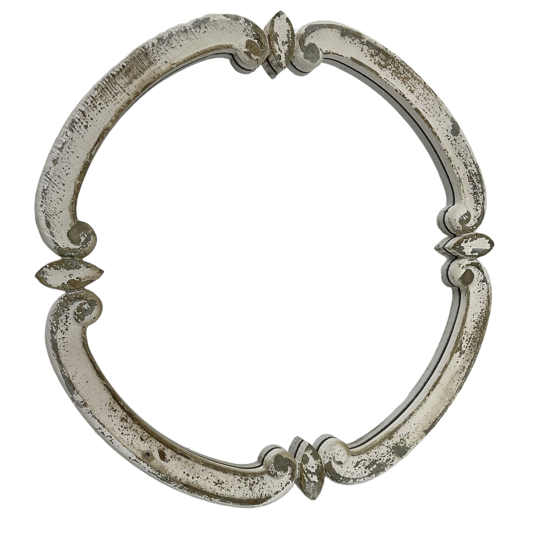 French design carved pine wall mirror, the frame in the form of conforming c-scrolls, plain mirror plate, in distressed white paint finish 