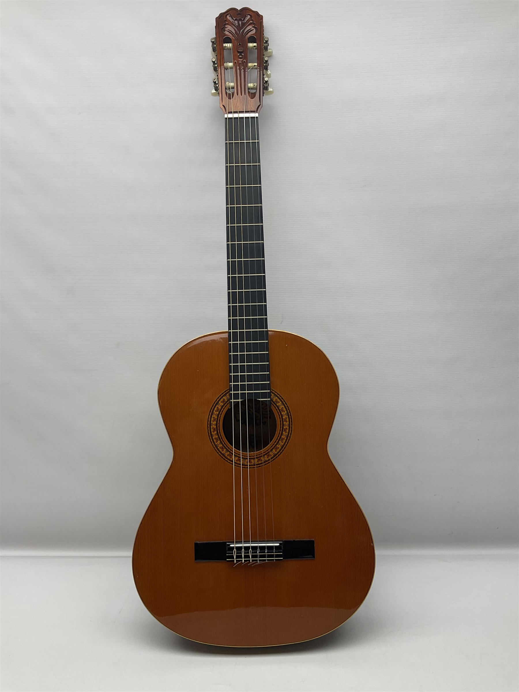 Harmony Model H6360 acoustic guitar in mahogany with spruce top, L103cm overall; and 1970s B&M (Barnes & Mullins) Concert Grande acoustic guitar, L101.5cm overall; each in hard carrying case (2)