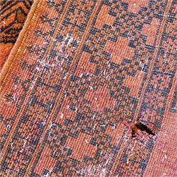 Persian Beluchi indigo ground prayer rug, overall geometric design (147cm x 85cm); together with a Bokhara rust ground rug (146cm x 101cm)