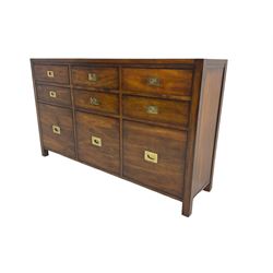 Cherrywood military style sideboard chest, fitted with nine drawers with recessed brass handles